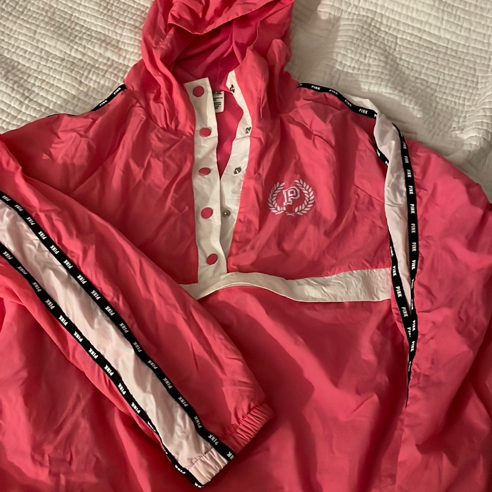 Cute pink wind breaker hoodie. Works as rain jacket as well